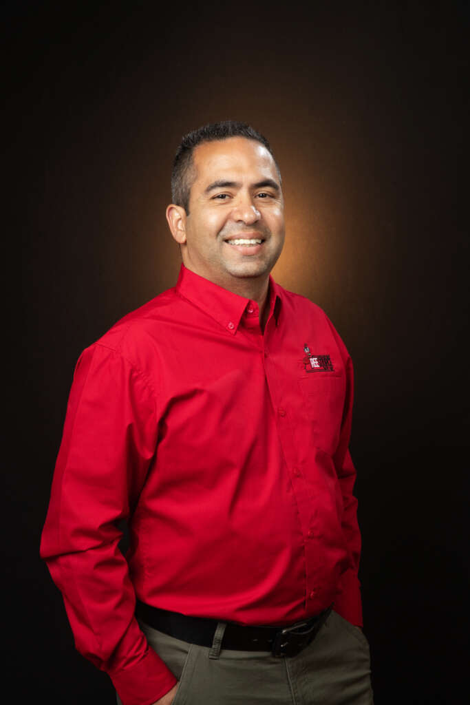 A professional team member from ReeSource Pest smiling for a portrait.